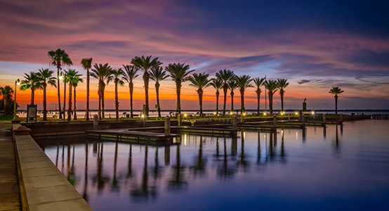 accessibility sunset view of downtown Sanford veterans park over water